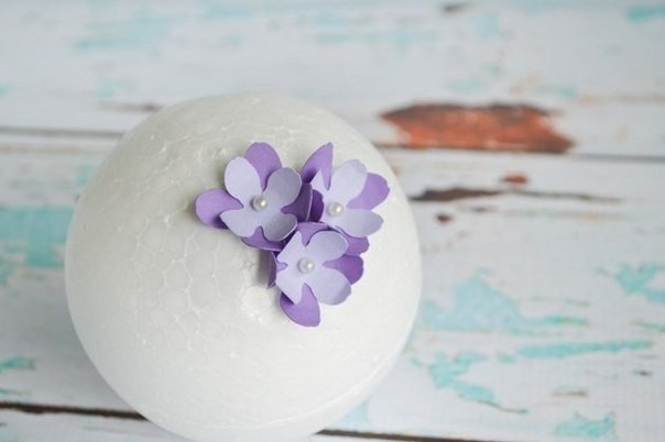 Learn how to make beautiful paper flower pomanders that are perfect for a DIY wedding or home decor