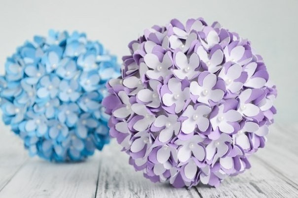 Learn how to make beautiful paper flower pomanders that are perfect for a DIY wedding or home decor