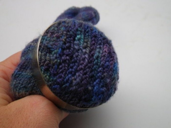 Using a darning mushroom to weave in ends